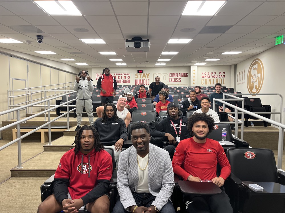 Freddie Scott II speaking with the San Francisco 49ers